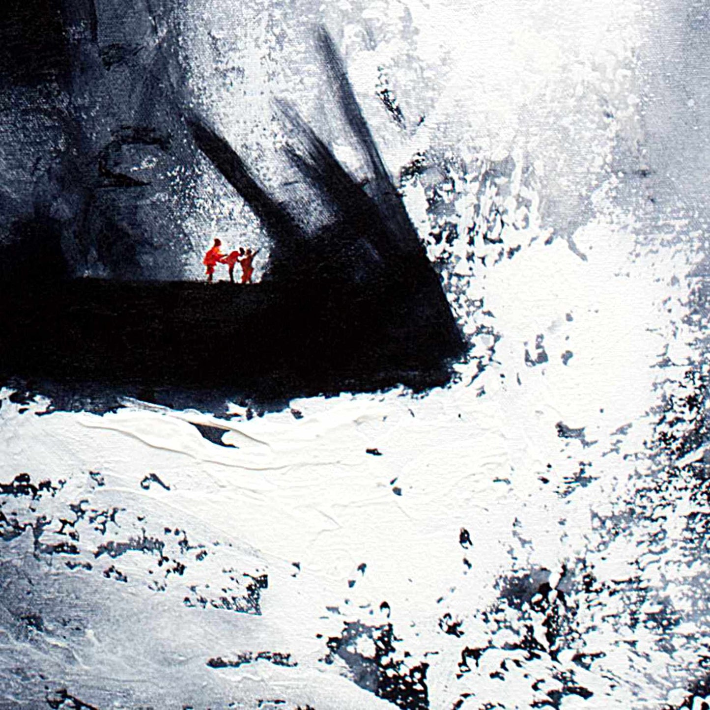 Three small figures standing on a coastal rock formation above the spume of a turgid sea.